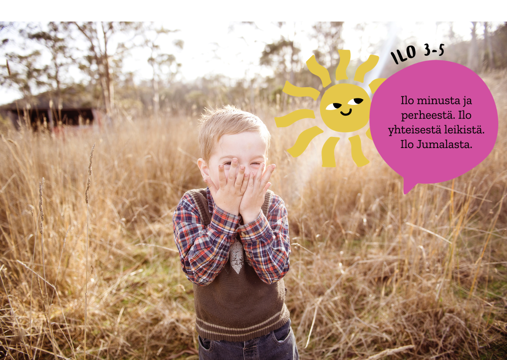 Piirretty aurinko. Puhekupla ilosta ja pieni poika nauraa kädet suun edessä. poika seisoo pellolla.